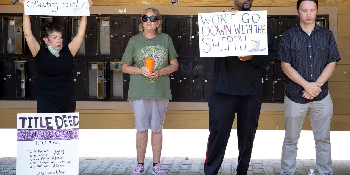 Residents and tenant activists protest the living conditions and management at Vista Del Rey Apartments